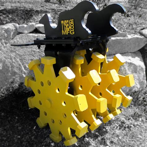 wheel excavator compact|sheepsfoot roller attachment excavator.